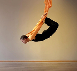 Aerial Yoga Pose Suspended Bow